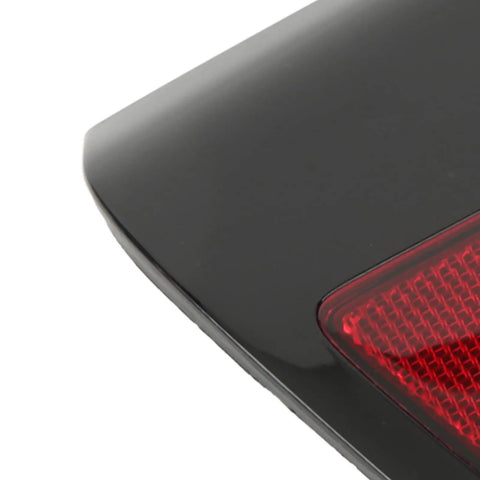 Close-up of Bolt On Replacement Right Side Rear Bumper Reflector Cover With Bold Red Lens For Tesla Model 3 And Model Y 2017 To 2020 Models.