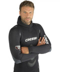 Man wearing 5mm Full Two-Piece Wetsuit For Spearfishing And Freediving In Black, XL, Soft Open-Cell Neoprene, showing front view.