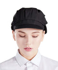 Top Shelf Three Pack Chef Hats For Women And Men With Brimmed Elastic Fit Breathable Poly Cotton Kitchen Cooking Caps For Restaurant Shifts And Weekend Cookouts, black chef hat on a woman.