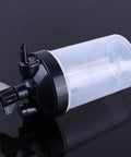 Oxygen Humidifier Bubbler Bottle 350ml with built-in pressure relief valve lying on its side, clear plastic construction.