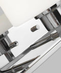 Close-up of Canfield Three Light Wall Bath Vanity Fixture in Brushed Nickel Finish with etched white glass shade detail