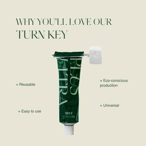 Toothpaste turn-key metal tube squeezer with roller; green tube inserted for easy use.
