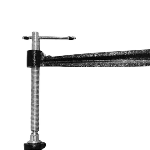 Close-up of metal Classical Guitar Bridge Clamp For Quick Maintenance And Bridge Repair, Pro Fixture Clip Tool With Accessories.