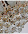 Close-up of the Fresh Crystal Lotus Frame featuring shimmering crystal beads on the Top Notch 52 Inch Gold Ceiling Fan With Light.