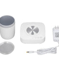 Keep Your Sip Game Strong With This Electric Cup Warmer And Chiller Featuring three auto timer modes on a white power base with insulated vessel.