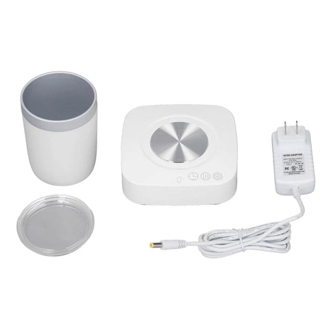 Keep Your Sip Game Strong With This Electric Cup Warmer And Chiller Featuring three auto timer modes on a white power base with insulated vessel.