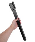 2 Pack Heavy Duty Folding Table Legs Made Of Metal With Self Locking Mechanism in hand, black finish