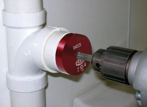 Clean Ream Extreme Pipe Reamer with three eighths inch hex shaft and one and a quarter inch aluminum head in use on PVC fitting