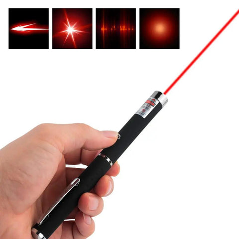 Hand holding a laser pointer emitting a red beam, part of a Three Pack Laser Pointer For Cats And Dogs Interactive Pet Toy Set With Red Green And Purple Lights Great For Playtime And Training Requires Two AAA Batteries Not Included.