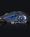 Straight Up Solid Wired Keyboard And Mouse Combo Featuring Backlit Retro Keycaps And Hella Responsive Floating Switches Delivers Mechanical Style USB Pc Laptop Setup Built For Gaming Or Daily Tasks - side view of gaming mouse with blue LED lights.