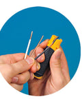 Person using Lil Ripper Wire Stripper With Slitting Blade to strip wires, showcasing ergonomic grip and precise cutting.