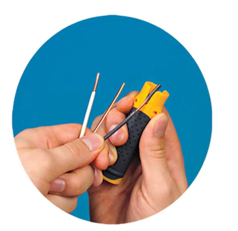 Person using Lil Ripper Wire Stripper With Slitting Blade to strip wires, showcasing ergonomic grip and precise cutting.