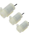 Three white 5 Piece Ultra Quiet Mini DC Submersible Water Pumps With Brushless Motor, 3 To 6 Volts, 120 Liters Per Hour