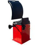 Heavy Duty Wheel Balancer Precise One Gram Accuracy Self Calibrating Garage Ready Tire Machine, red with lid open for easy access.
