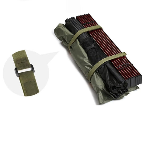 Four Pack Heavy Duty Luggage Tie Down Straps With Quick Buckles For Securing Trail Gear Locked Down On Tailgate Tours And Campouts Made From Strong Polyester Bungee That Grips Tight On Every Road Trip, showing green straps securing camping gear.