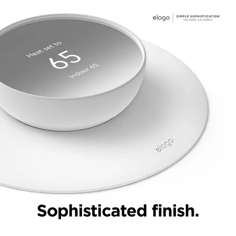 Wall Plate Cover Set For Google Nest Thermostat 2020 Snow Finish Durable Polycarbonate Material Easy Install Sleek Dope Look Complementary Design In House Designed To Fit Perfectly And Look Great, showing circular white finish with temperature display