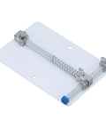 Heavy Duty Stainless Steel PCB Holder And Fixture Clamp For Small Circuit Boards on flat surface, adjustable grip visible.