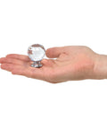 Hand holding one 42mm round crystal knob from the Crystal Knobs Set Six Pack Round Ball 42mm Cabinet Knobs With Screws For Dresser Drawers Cabinets