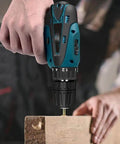 No Fuss Cordless Electric Drill And Screwdriver With 1.5Ah Lithium Battery Led Work Light Variable Speed Trigger in use on wood.