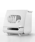 Compact Portable Countertop Dishwasher Offering No Sweat Installation And Smart Auto Wash Cycles Perfect For Small Kitchens Where Convenience Is King Plus Built In Antivirus Sterilizing Tech Keeps Dirty Plates Clean All Day Long shown from the side, featuring clean white finish and storage for dishes.