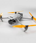 Orange propellers on DJI Mavic 3 featuring Stealth Propellers For DJI Mavic 3 Series Orange 4 Pack Low Noise Up To 2 dB Reduction And 37 Percent Sound Power Reduction Plus About 2 Minutes Longer Flight Time And Improved Efficiency.