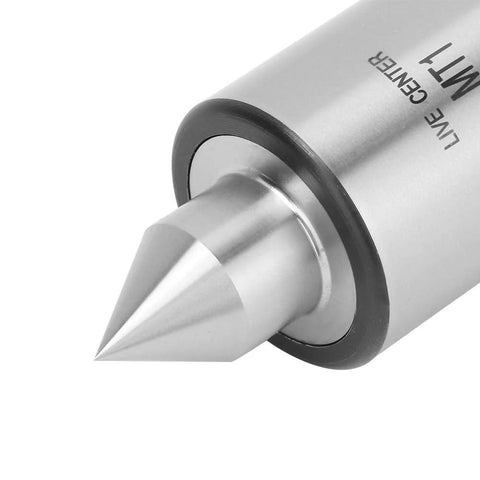 MT1 triple bearing live center tip close-up on metal lathe, hard alloy steel