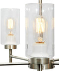 Close-up of 5-Light Modern Chandelier With Clear Glass Shades And Brushed Nickel Finish For Dining Room Living Room Bedroom Home Decor Contemporary Ceiling Lighting Fixture, showing clear glass shades and nickel finish.