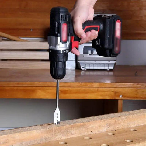 Straight Up No Sweat Cordless Drill With Variable Speed Lithium Ion Battery And Charger Set For Quick Home Repair Jobs Featuring Keyless Chuck And Bright Led Light in use, drilling into wood.
