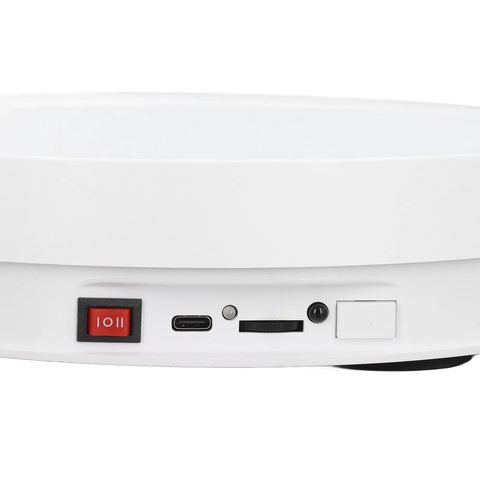 Electric Rotating Display Stand With Remote Control For Smooth 360 Degree Videos showing USB port and power switch.