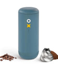 Nuttii&Timemore OX Electric Coffee Grinder Portable Conical Burr Design in navy blue with coffee beans and grounds