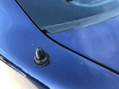 Super Shorty 1.5 Inch Antenna For Saturn Sky Black Powder Coated Billet Aluminum Plug N Play Includes 0.75 Inch Delete Cap Easy Install Sleek Shorty Look That Upgrades Your Ride Style Every Day shown installed on a car hood.