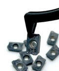 Close-up of 10 Pack Hard Alloy HM90 APKT 1003PDR IC908 External Turning Tool Inserts For CNC Lathe, with focus on alloy material.