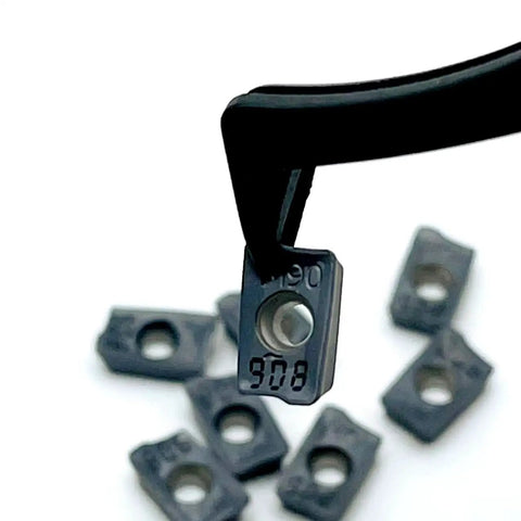 Close-up of 10 Pack Hard Alloy HM90 APKT 1003PDR IC908 External Turning Tool Inserts For CNC Lathe, with focus on alloy material.