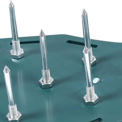 Close-up of spiked soles on Ultimate Lawn Aerator Shoes with durable PP plastic and iron nails for quick soil loosening