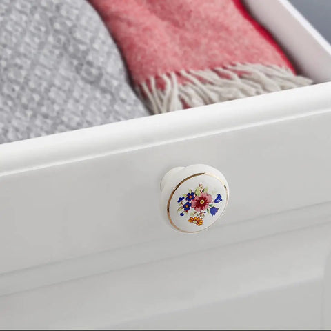 Ceramic Hand Painted Drawer Knobs Four Pack Vintage Floral Cabinet Pulls For Dresser Cupboard Wardrobe And Closet With Glossy White Flower Design And Smooth Operation installed on drawer