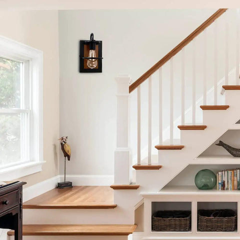 Set Of Two Farmhouse Wall Sconces With Modern Industrial Vibe, Matte Black Finish And Faux Wood Backing in a stairway