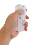 Hand holding the remote control for Vintage Industrial Caged Ceiling Fan Light Fixture with Remote,7-Blade Fan.