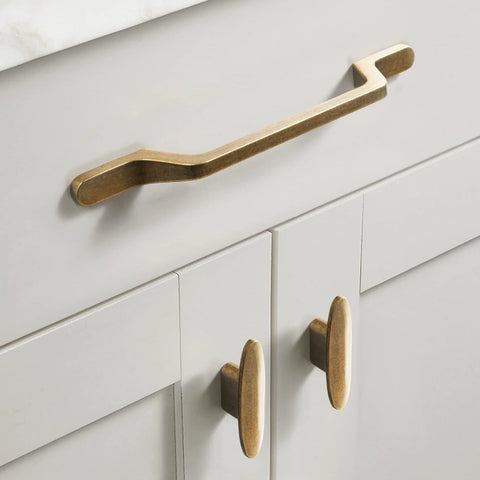 12 Pack 3 Inch Large Oval Antique Brass Cabinet Drawer Pulls For Dresser Cupboard Wardrobe With Single Hole Mount shown on white cabinets.