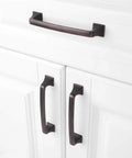 Oil Rubbed Bronze 5 Inch Cabinet Pulls Pack Of 10 Solid Metal Contemporary Big Square Arch Handles installed on white cabinets