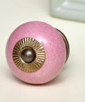 Swanky Pink Crackle Ceramic Drawer Knobs For Kitchen Cupboard Hardware And Dresser Pulls With Rust Proof Heavy Duty Screws Quick Install Top Shelf Home Decor Accents, detailed close-up view of pink ceramic knob.