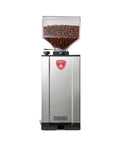 Silent conical burr grinder from the espresso bundle showing a sleek design and coffee beans, Level Up Your Home Barista Setup With This Sleek Copper And Chrome Espresso Machine Paired With A Silent Conical Burr Grinder In A Complete Bundle Crafted For Smooth Extractions And Effortless Daily Coffee Vibes.