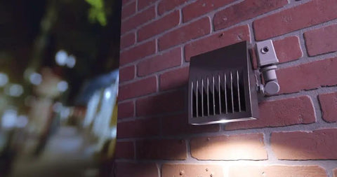 120 Volt Stem and Swivel Mount Thermal Photocontrol with Auto Light Sensor on brick wall