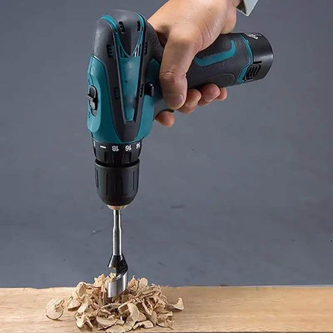 Compact 12V Cordless Power Drill With Slick Quick Chuck And Two Speed Modes Lightweight Badass Electric Screwdriver drilling wood shavings.