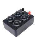 Acxico resistance box with four rotary dials and red/black terminal posts on a black plastic enclosure.