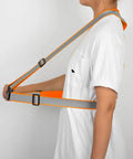 Built Tough Adjustable Safety Vest Straps With Big Bright Reflective Coating For Construction Sites And Weekend Rides No Hassle Custom Logo Setup Ansi Rated Durable Fire Engine Orange One Pack worn by person, showing adjustable fit.