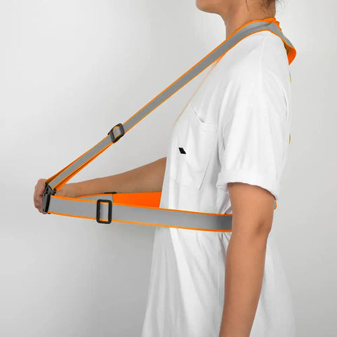 Built Tough Adjustable Safety Vest Straps With Big Bright Reflective Coating For Construction Sites And Weekend Rides No Hassle Custom Logo Setup Ansi Rated Durable Fire Engine Orange One Pack worn by person, showing adjustable fit.