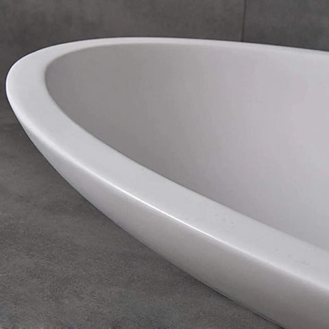 Close-up of the edge of a Top Shelf White Oval Vessel Vanity Sink Solid Artificial Stone Above Counter Bowl Basin.