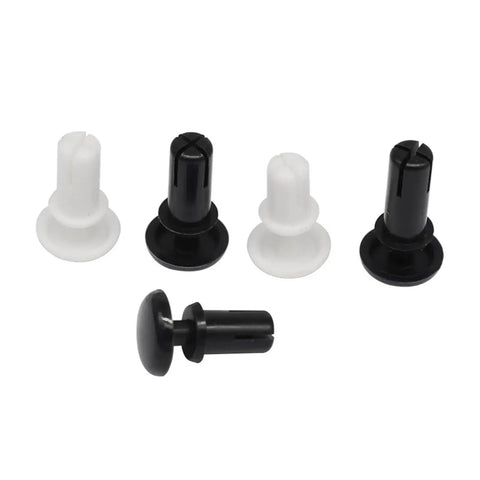 Four nylon threaded inserts from 120 Pack R Type Expansion Rivet Nuts in black and white, ideal for thin panel attachment.