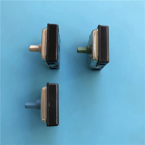 Three 4 Position Rotary Switches For Electric Heaters And Radiators displayed on a blue background, showing different colored knobs.