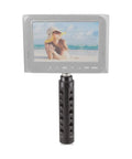 Aluminum Camera Handle Grip For Small Cameras Camcorders And DSLRs With CNC Machined Aluminum Construction Anodized Black Finish attached to monitor
